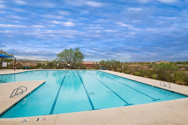 community pool with fence