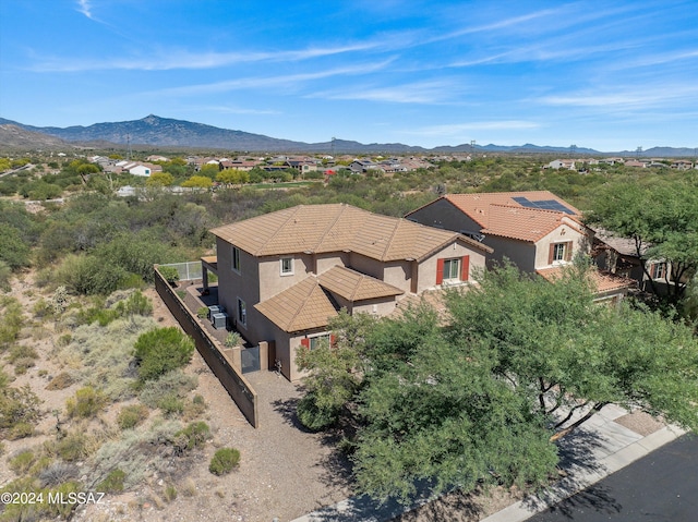 birds eye view of property featuring a mountain view