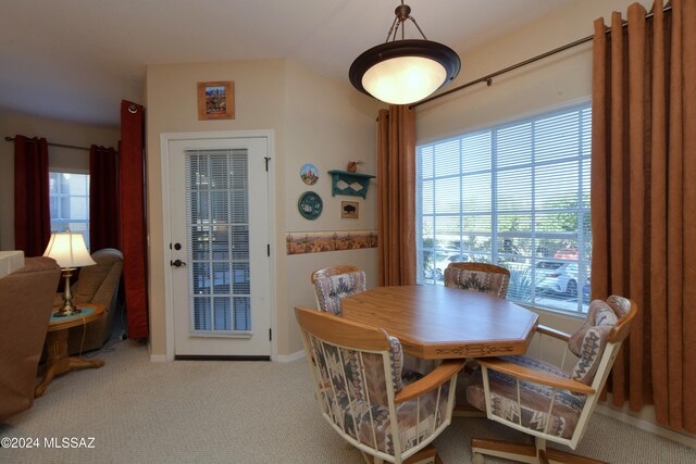 view of carpeted dining area