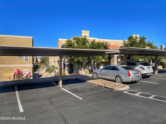 view of car parking featuring a carport