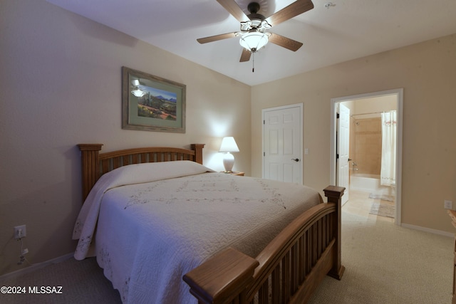 carpeted bedroom featuring connected bathroom and ceiling fan