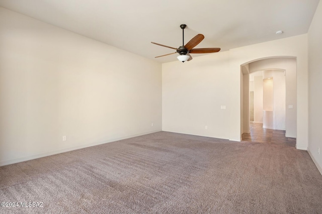 unfurnished room featuring carpet flooring and ceiling fan