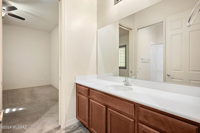 bathroom featuring ceiling fan and vanity