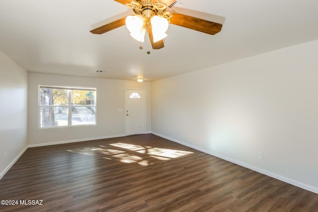 interior space featuring dark hardwood / wood-style floors and ceiling fan