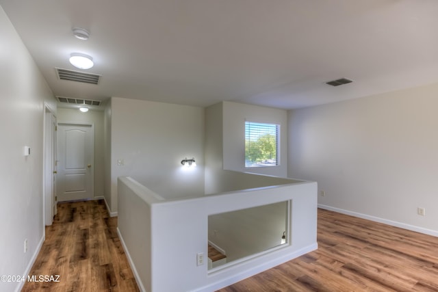 hallway featuring hardwood / wood-style floors