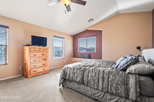 bedroom with carpet, ceiling fan, and lofted ceiling