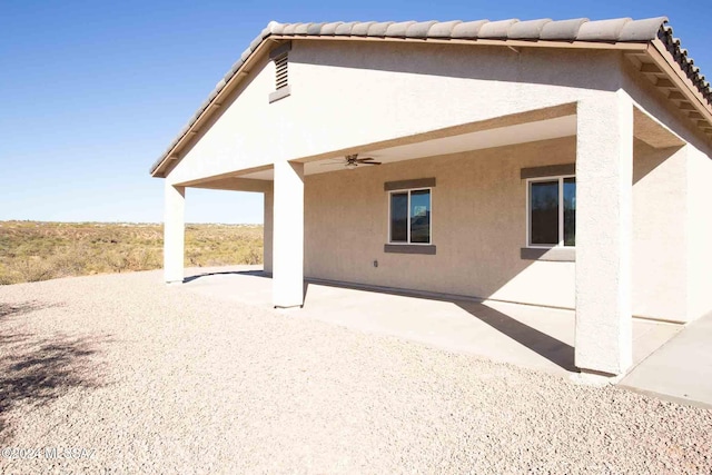 back of house featuring a patio area