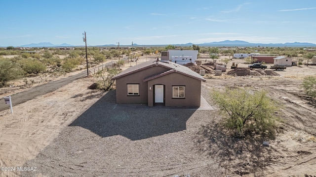 view of front of house with a mountain view