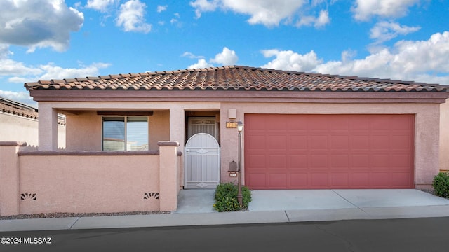 view of front of home featuring a garage