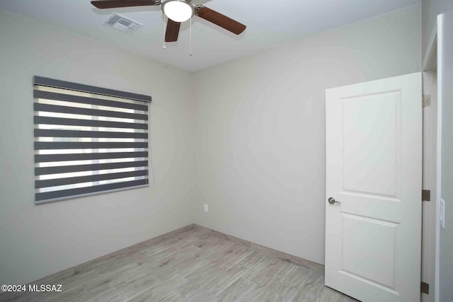 unfurnished room featuring light wood-type flooring