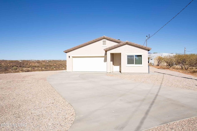 single story home with a garage