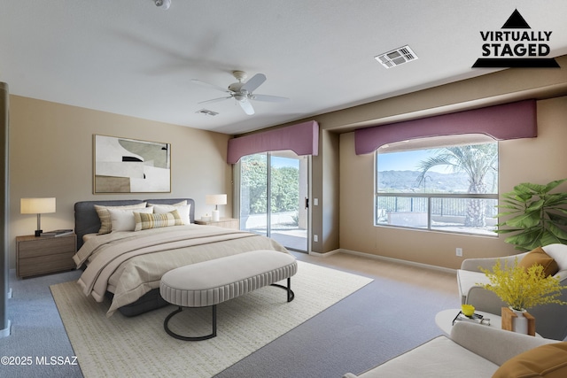 bedroom with access to exterior, ceiling fan, visible vents, and light colored carpet