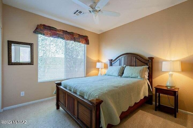 bedroom featuring carpet, visible vents, ceiling fan, and baseboards