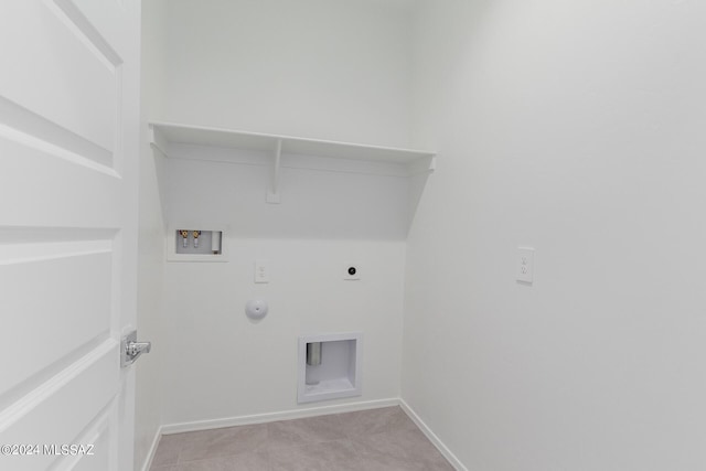 washroom with electric dryer hookup, gas dryer hookup, light tile patterned flooring, and washer hookup