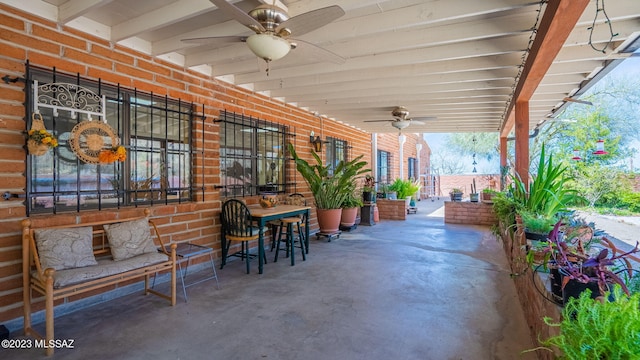 view of patio featuring ceiling fan