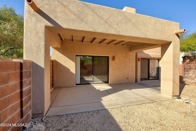 rear view of house featuring a patio area