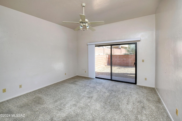 empty room with carpet flooring and ceiling fan