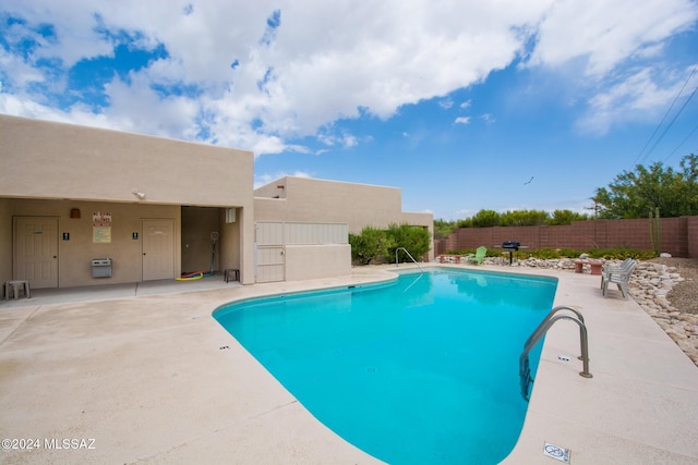 view of pool with a patio area