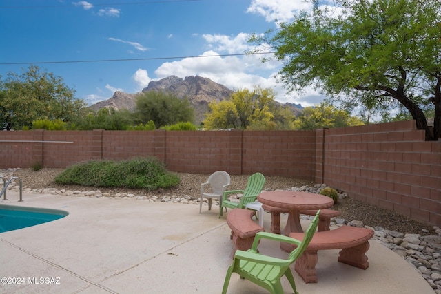 view of patio with a mountain view