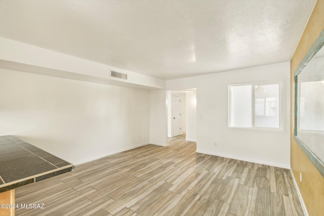 empty room featuring light hardwood / wood-style flooring