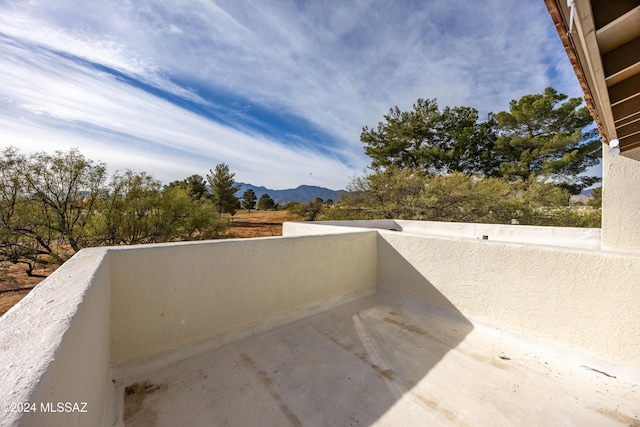 balcony featuring a mountain view