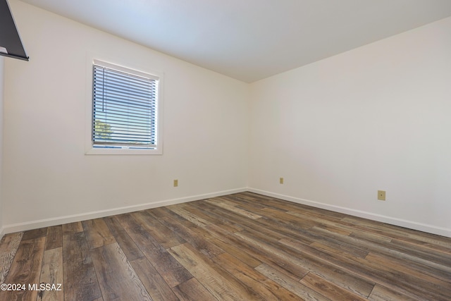 empty room featuring wood-type flooring