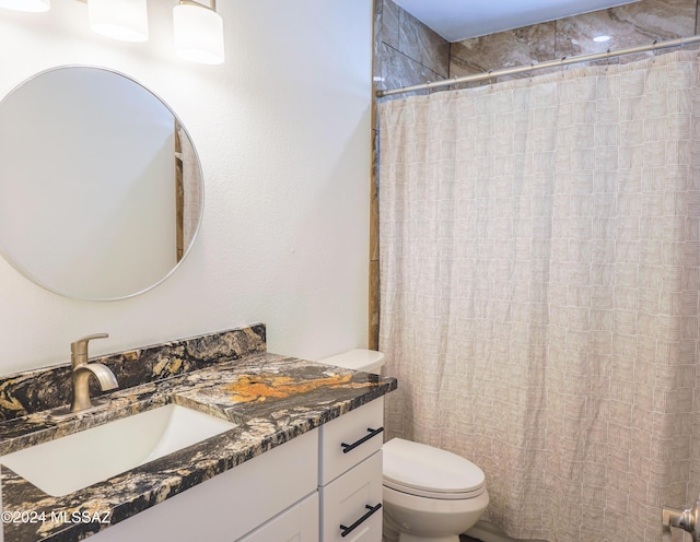 bathroom with a shower, vanity, and wood-type flooring