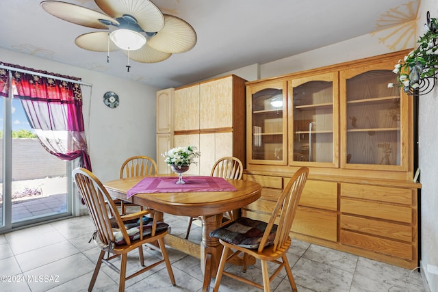 dining room with ceiling fan