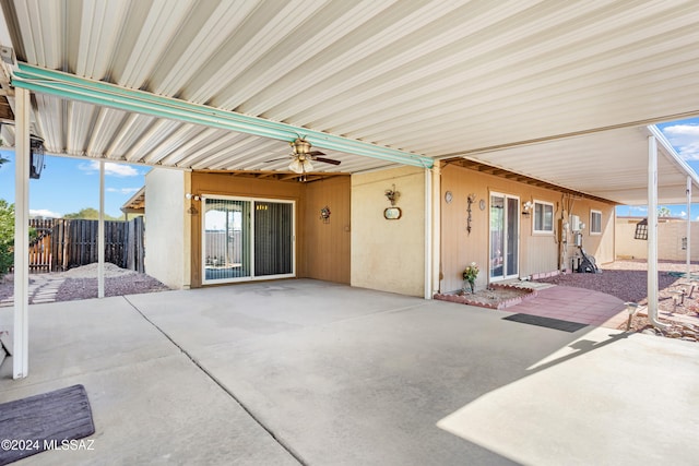 view of patio featuring ceiling fan