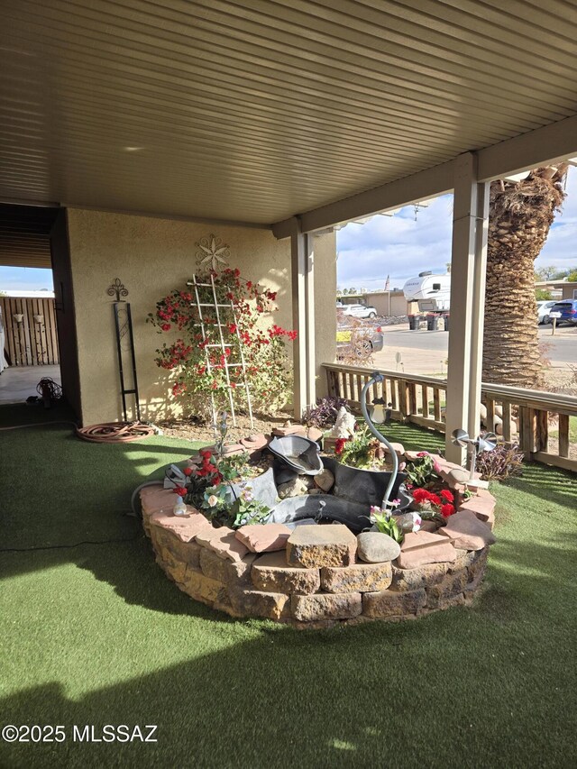 view of patio / terrace featuring ceiling fan