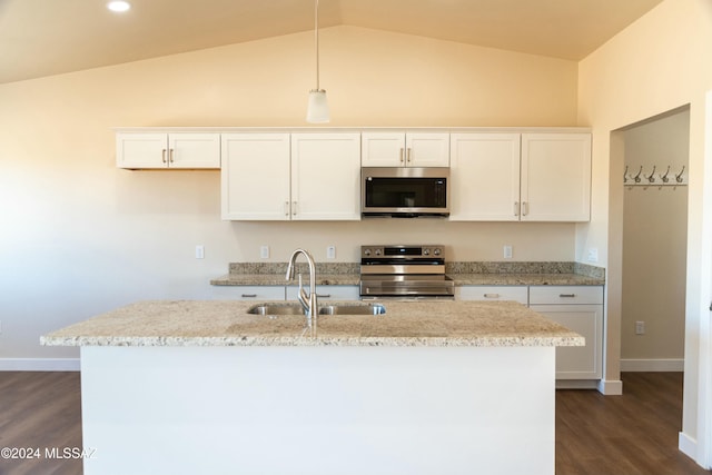 kitchen with lofted ceiling, white cabinets, hanging light fixtures, sink, and appliances with stainless steel finishes