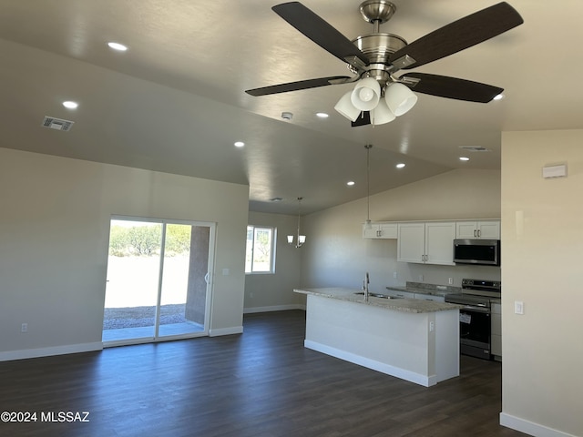 kitchen featuring lofted ceiling, a kitchen island with sink, white cabinets, ceiling fan, and appliances with stainless steel finishes