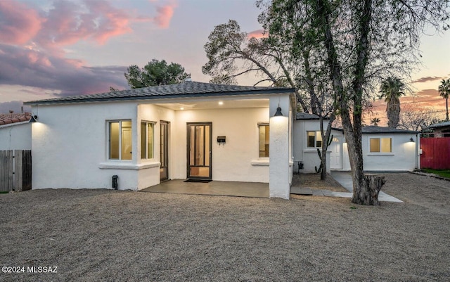 view of front of house featuring a patio area