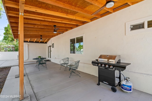 view of patio / terrace featuring ceiling fan and a grill