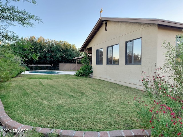 view of yard featuring a fenced in pool