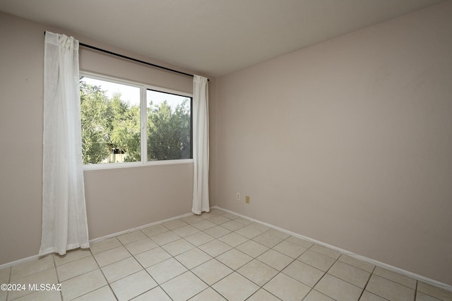 view of tiled empty room