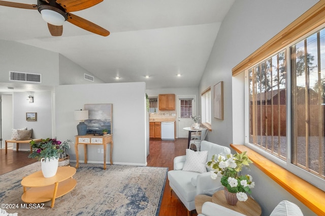 living room featuring ceiling fan, high vaulted ceiling, and dark hardwood / wood-style floors