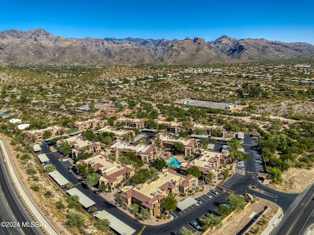 birds eye view of property featuring a mountain view