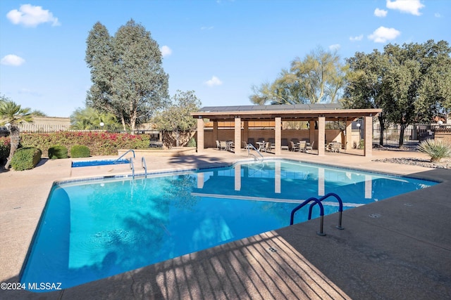 view of pool with a patio area