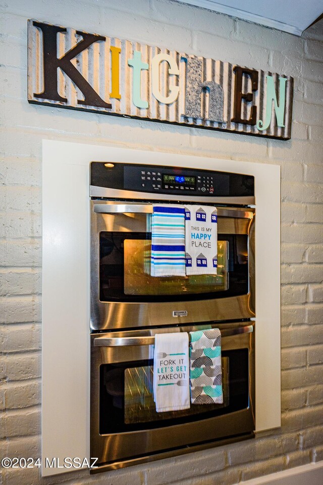 room details featuring stainless steel double oven