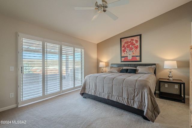 carpeted bedroom featuring access to outside, vaulted ceiling, multiple windows, and ceiling fan