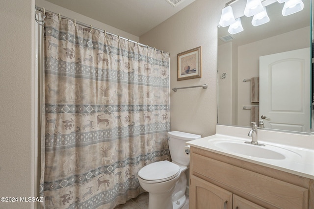 bathroom with a shower with curtain, vanity, and toilet