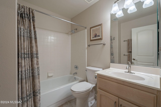 full bathroom featuring tile patterned flooring, shower / bath combo, toilet, and vanity