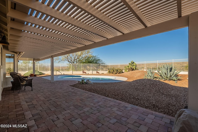 view of patio / terrace with a pergola and a fenced in pool