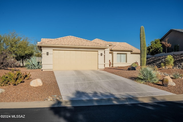 view of front of property featuring a garage