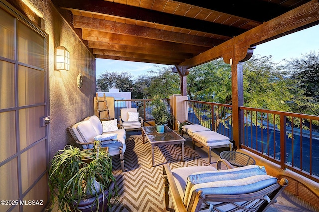 view of patio / terrace featuring an outdoor hangout area and a balcony