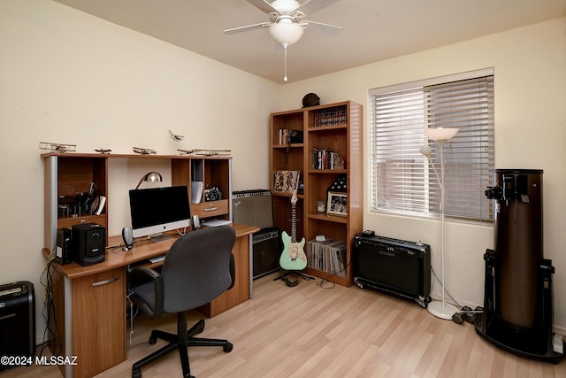 office with ceiling fan and light wood-type flooring