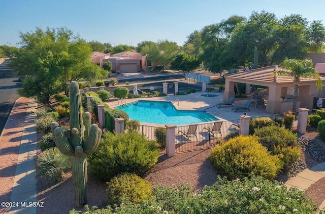 view of swimming pool featuring a patio