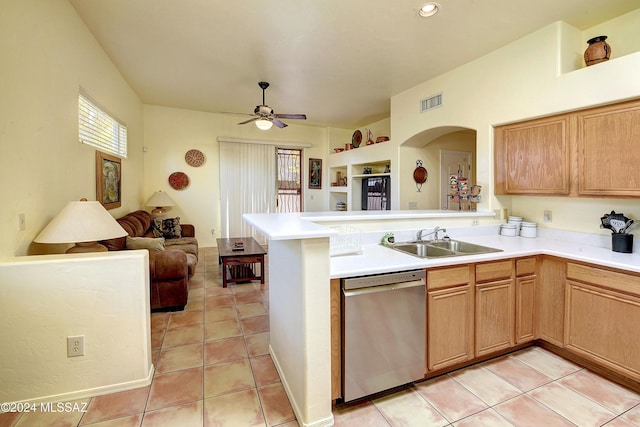 kitchen with ceiling fan, dishwasher, sink, kitchen peninsula, and light tile patterned flooring