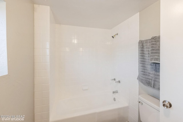 bathroom with shower / tub combination and toilet